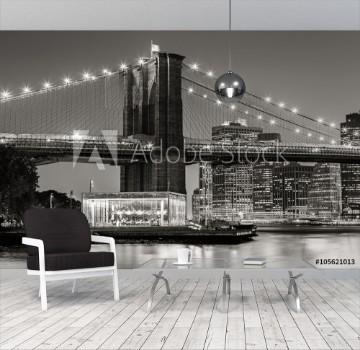 Picture of Black and White of Brooklyn Bridge Tower at twilight with carousel and skyscrapers of Lower Manhattan Financial District New York City